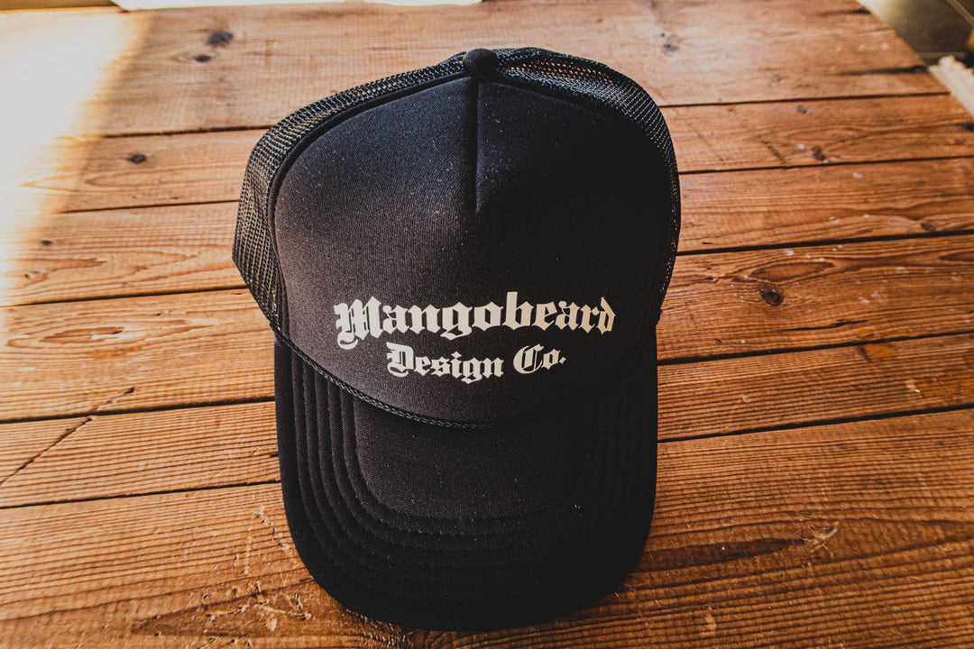 Mangobeard Design Co - Blackletter print - Trucker Cap - mangobeard