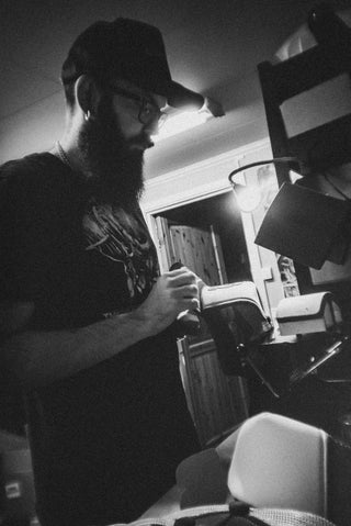 mangobeard is pressing a trucker cap